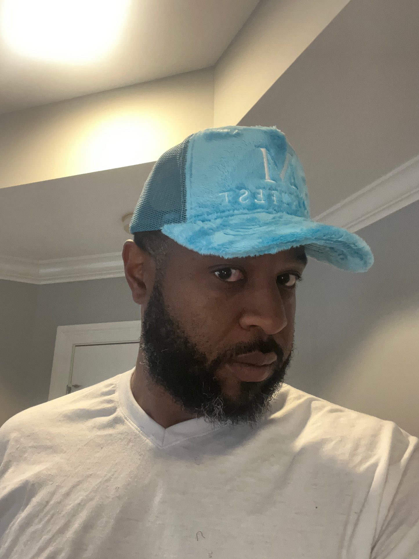 SKY BLUE FUZZY VALVET MANIFEST TRUCKER HAT